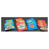 Empty Trading Card Packs Featuring Various Themes