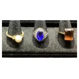 Three Rings With Pearl, Sapphire, and Amber Stones