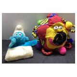 Two Plush Toys Featuring a Smurf and a Multicolore