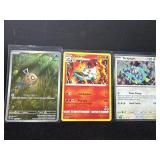 Three Pokemon Cards: Feebas, Volcarona, and Terapa