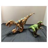 Two Plastic Dinosaur Toys with Jointed Limbs