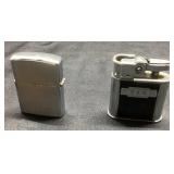 Two Vintage Metal Lighters, Including Reliance