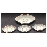 Four Porcelain Dishes with Hand-Painted Floral Mot