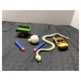 Toys Lot Including Snake, Trailer, and Toy Car