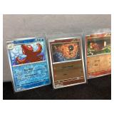 Three Pokemon Trading Cards Featuring Octillery, C