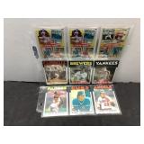9 Baseball Cards Featuring Pete Rose, Ozzie Smith,