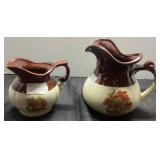 7ï¿½ and 5ï¿½ McCoy Pottery Pitchers with Brown and Cr