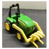 Green and Yellow John Deere Toy Tractor with Front