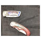 Decorative Folding Knives Featuring Wolf and India