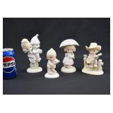 4 Precious Moments Figurines