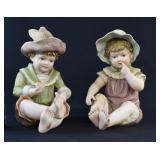 Pair Large 12" Bisque Porcelain Piano Babies