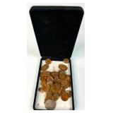 Rusted Coins in a Black Case