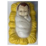 Infant Jesus Figurine on Yellow Straw Bed