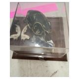 Skull and teeth in glass case