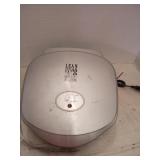 Lean mean fat grilling machine