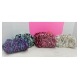 4 hand-knitted booties