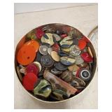 Tin full of buttons
