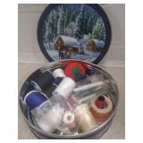 Tin of sewing thread