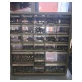 Storage organizer full of screws and nuts