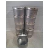 11 empty tins