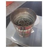Coffee can half full of cotter pins