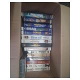 Box of 26 vhs tapes
