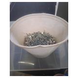 Tub of nails