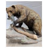 Bear with fish statue