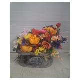 Fake flowers in a basket