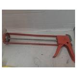 Vintage newborn caulk gun