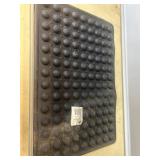 Black rubber bubble mat