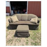 Cushioned Couch With Auto man And Throw Pillows