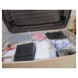 LARGE STORAGE BIN FULL WITH VARIOUS ITEMS