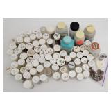 Pennies in 79 plastic medicine tubes and bottles