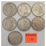 6 1921 Morgan dollars, 1 1922 Peace dollar