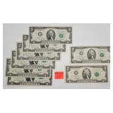 8 $2 dollar bills
