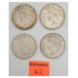 4 peace silver dollars
