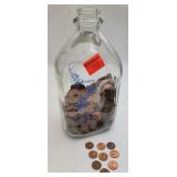 approximately 1150 pennies in 1/2 gal milk jar
