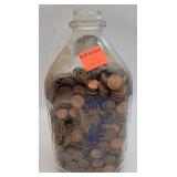 approximately 2,250 pennies in 1/2 gal milk jar