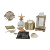 Collection of coastal-themed home decor items