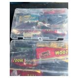 Lot of fishing worms and containers