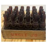 Vintage uncle Jo soda bottles and crate