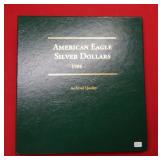 20 Silver Eagles with Free Book - Including 1986