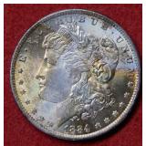 1884 O Morgan Silver Dollar - multicolor toning