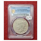 1928 Peace Silver Dollar PCGS Genuine AU Detail