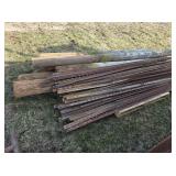 Fence Posts: 7 wooden; approx 50 T