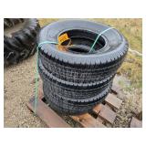 Four 235-80R16 tires