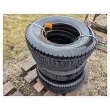 Four 235-80R16 tires