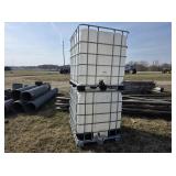 Two poly totes w/cages