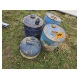 four kerosene cans